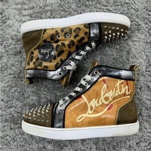 Christian Louboutin Lou Spikes
Kraft Flat High Top Sneakers
Womans 37 US 6.5